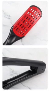 Macro views of the red V-shaped hair straightener brush with black ergonomic handle