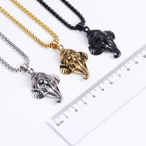 Three-color Ganesha pendant necklaces in gold, silver and black with measurement ruler