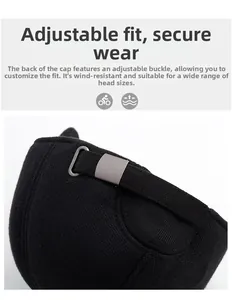 Detail of adjustable gunmetal buckle and fabric strap on the back of the black winter cap