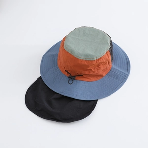 Detail of multi-color outdoor sun hat with neck protection flap and adjustable drawcord