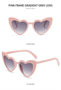 Front and side views of heart shaped pink sunglasses with gradient grey lenses