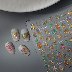 3D embossed ocean nail stickers with gold seashells, starfish, and sea turtles