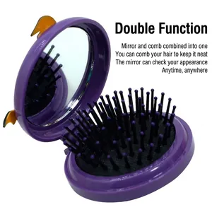 Purple foldable pumpkin hairbrush with massage cushion and built-in vanity mirror