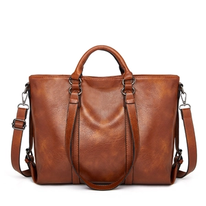 Borsa tote marrone in pelle cerata vintage con doppi manici e tracolla regolabile