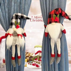 Christmas Gnome curtain tiebacks with buffalo plaid hats on dark blue drapes