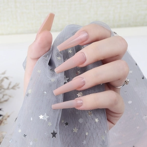 Glossy nude pink long ballerina press-on nails with shiny UV top coat finish