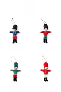 Four nutcracker soldier fabric ornaments in diverse festive colors with hanging strings