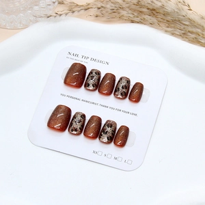 Handmade amber leopard cat-eye press-on nails in short square shape with size guide