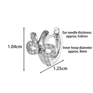Bow knot hoop earrings in silver with white zirconia and detailed product dimensions