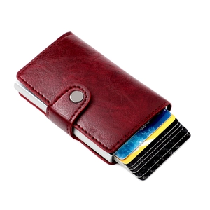 Detail view of burgundy leather RFID blocking wallet with pop-up card mechanism