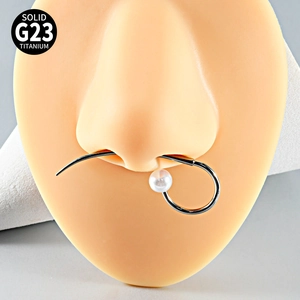 Piercing jewelry on nose model showing G23 titanium septum ring with white faux pearl