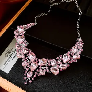Luxurious pink crystal teardrop statement necklace in French palace style with silver base
