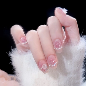 Pink translucent press-on nails with 3D camellia flowers and sparkling silver glitter