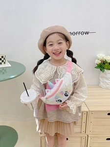 Cute sequined unicorn belt bag for girls with adjustable pink strap on a child model