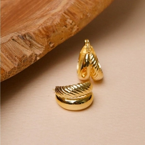 Minimalist 925 silver golden hoop earrings with elegant textured croissant design