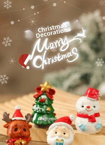 Detailed close-up of resin Christmas miniatures featuring Santa, reindeer, and snowman