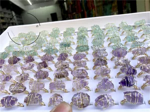 Wholesale collection of handmade wire wrapped natural amethyst and crystal rings