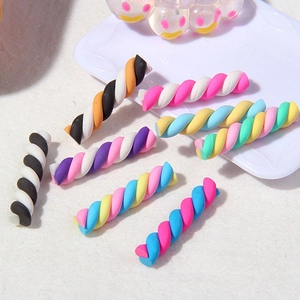 Colorful twisted polymer clay rainbow sticks for DIY craft and phone case decoration
