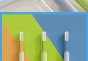 Three silicone pet toothbrushes in orange green blue with protective caps detail