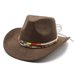 Close-up of ethnic woven band with shells on dark brown suede cowboy hat detail
