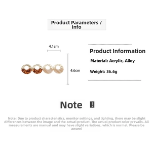 Macro view showing dimensions and weight of acrylic irregular earrings with amber texture