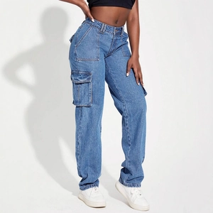 Detail of cargo pockets and deep blue wash denim fabric on women straight jeans