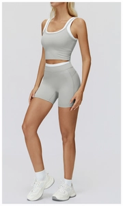 Detail of high-stretch seamless rib-knit fabric on high-waist grey yoga shorts