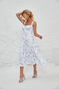 Detailed side slit view of a blue floral sundress with sleeveless strap design