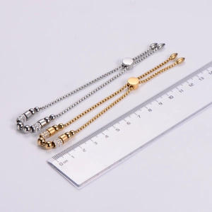 Detail of adjustable stainless steel box chain bracelets with crystal bead accents