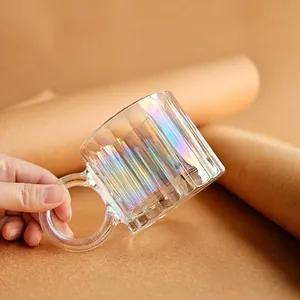 Iridescent glass mug with vertical ribbed texture and large round handle minimalist design
