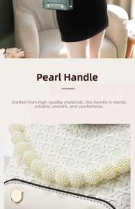 Detail of white woven leather texture with elegant large pearl handle and metal hardware