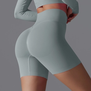Close-up of high-waisted seamless yoga shorts featuring scrunch butt and knit texture