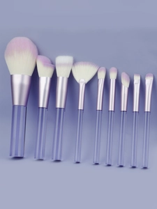 Detail of 9-piece makeup brush set with purple transparent handles and gradient bristles