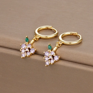 Detail of purple zircon grape hoop earrings with S925 silver stamp on brown display