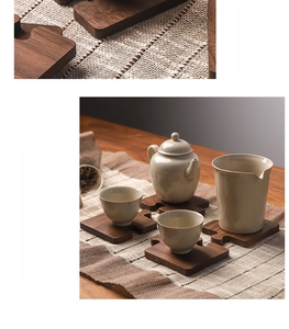 Detailed view of puzzle-shaped black walnut wood coasters used as tea cup heat mats