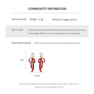 Detailed specs for vintage red bow earrings with zirconia pendants and copper material