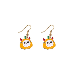 Detail of Halloween pumpkin skeleton earrings with orange enamel finish and gold hooks