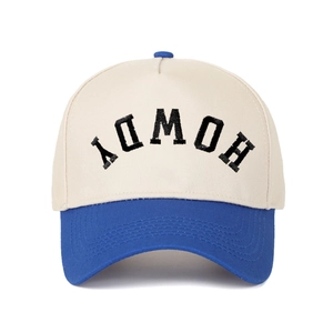 Close-up of inverted HOWDY embroidery on high-density cotton five-panel baseball cap