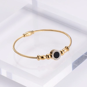 Elegant 18k gold plated stainless steel wire cable bracelet with black enamel and diamonds
