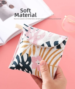 Close-up of portable floral sanitary napkin pouch made of soft polyester and knit fabric