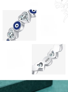 Detailed view of S925 sterling silver evil eye ring with heart-shaped white zircon inlay