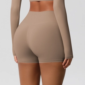 Close-up of high-waist yoga shorts showing seamless back design and peach lift effect