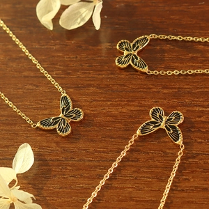Minimalist 18K gold plated butterfly pendant necklace with black enamel detail