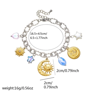 Gold plated stainless steel bracelet with celestial sun moon and star pendants