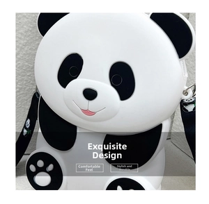 Close-up of a cute 3D panda silicone shoulder bag with black fabric strap and animal patterns