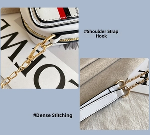 Detail of metal strap hooks and precise stitching on vintage radio-style crossbody bag
