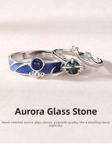 Macro shot of s925 silver couple rings featuring blue glazed stone and star patterns