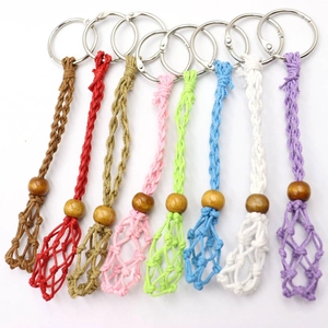 Detail of 8-color macrame mesh net keychains with wooden beads and silver metal rings