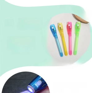 Close-up of 4-pack UV magic pens with LED lights for invisible ink and banknote verification