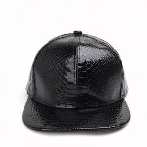 Hip hop snapback hat featuring black crocodile pattern leather and flat brim design